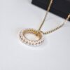 20260119_151638-scaled-1.jpg White & Gold Circle Pendant Necklace
